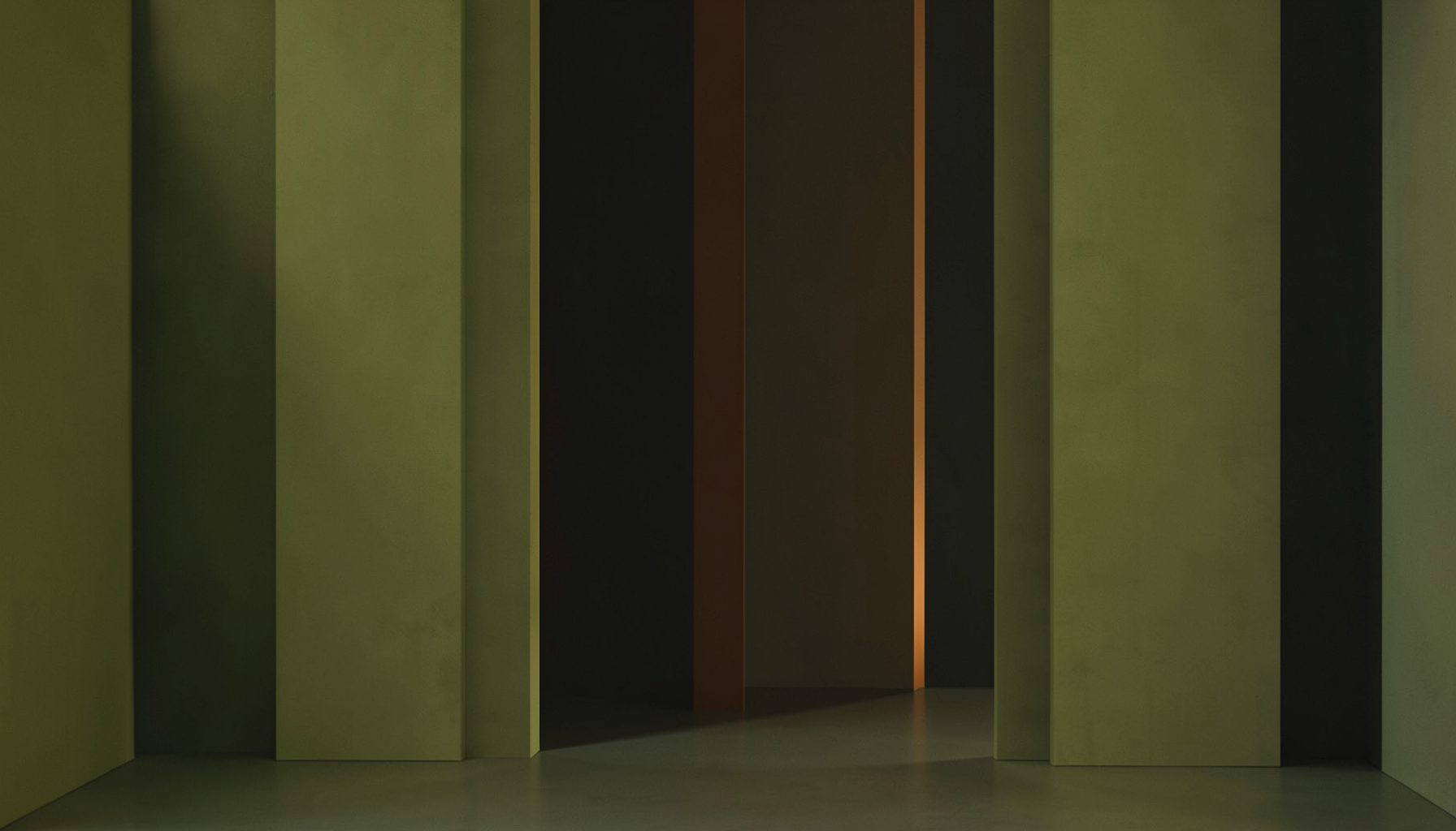 Muted olive and charcoal abstract backdrop with a subdued, contemplative atmosphere.